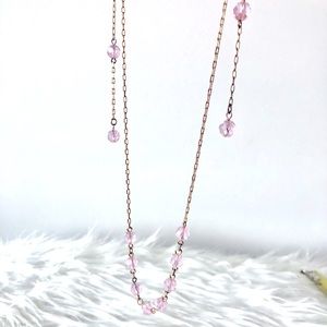 Pink and gold lariat necklace
